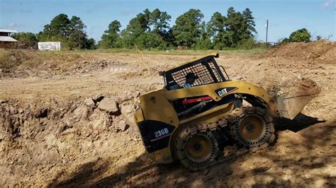 Skid Steer or Backhoe for digging a pond 